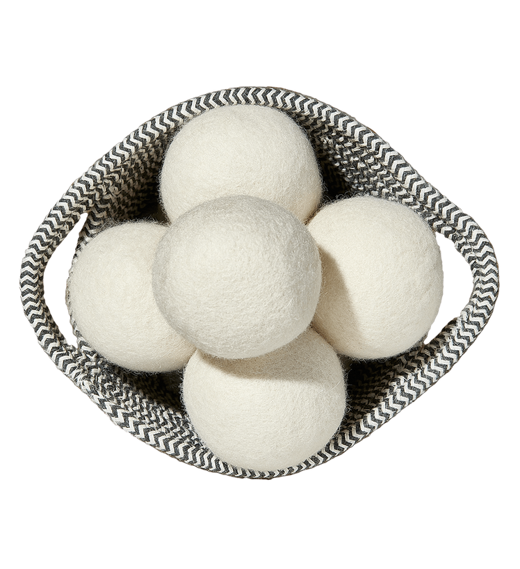 Another small basket filled of All Natural Wool Dryer Balls.